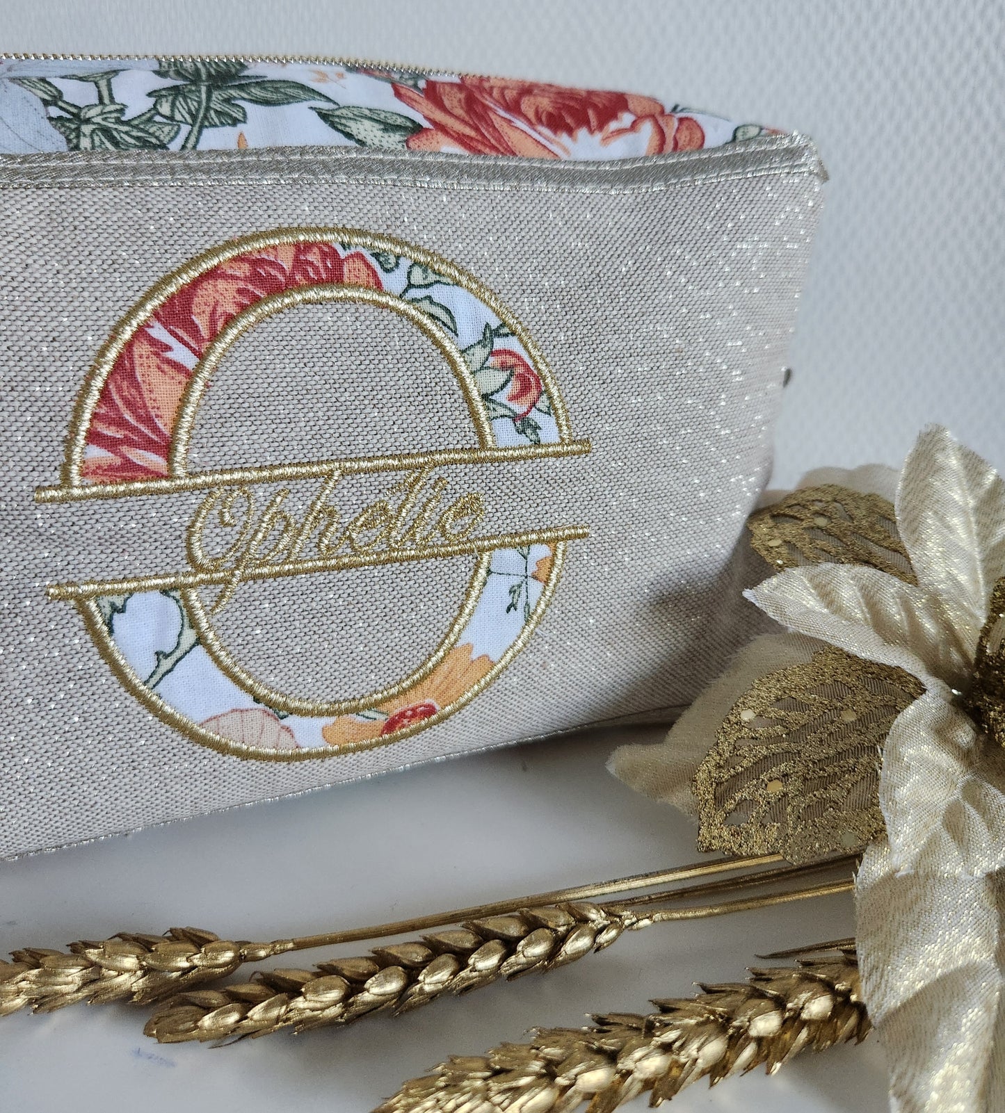 Trousse de toilette beige scintillant et fleurs d'automne
