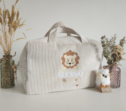 Corduroy suitcase with floral capital letter
