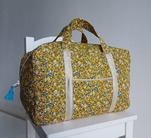 Mustard yellow floral suitcase