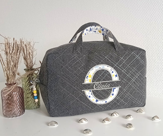 Grey and silver suitcase