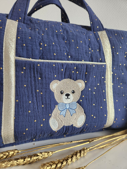 Quilted diaper or travel bag, double cotton gauze with gold polka dots.