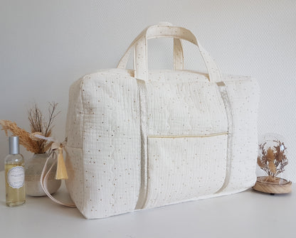 Sac à langer ou de voyage matelassé, double gaze de coton à pois dorés  .