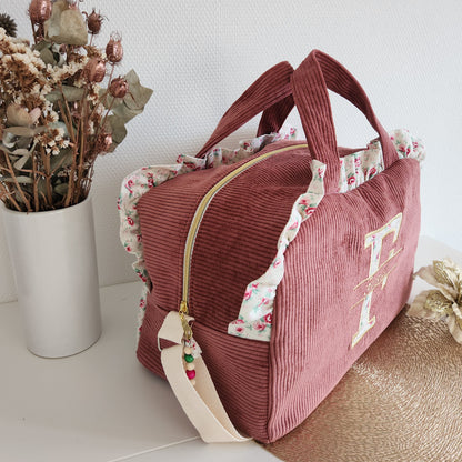Quilted diaper or travel bag, double cotton gauze with gold polka dots.