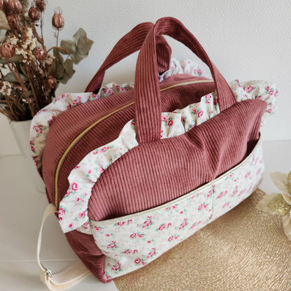 Quilted diaper or travel bag, double cotton gauze with gold polka dots.