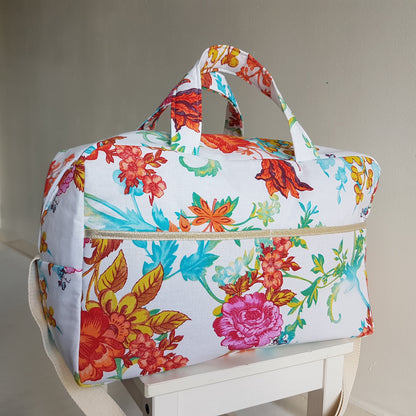 Sac à langer ou de voyage, grosses fleurs multicolores.