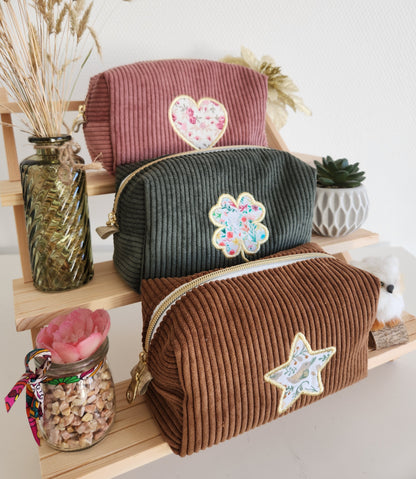 Trousse à maquillage en velours côtelé et motif brodé