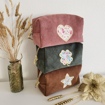 Trousse à maquillage en velours côtelé et motif brodé
