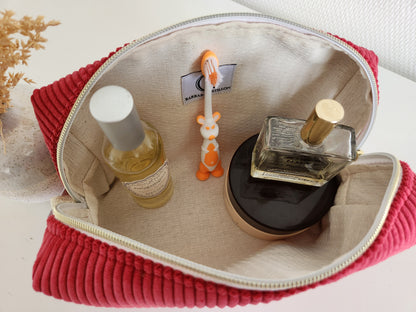 Trousse de toilette motif noeud en velours côtelé