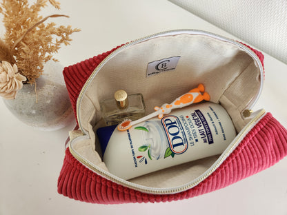 Trousse de toilette motif noeud en velours côtelé