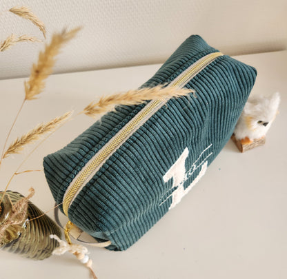 Trousse de toilette en velours côtelé et moumoute écrue