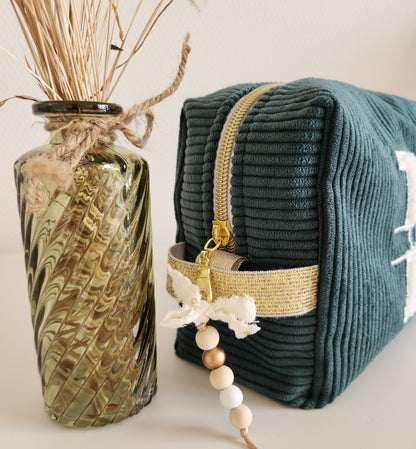 Trousse de toilette en velours côtelé et moumoute écrue